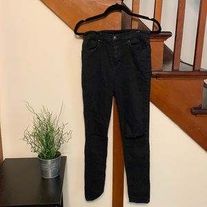 Black high rise skinny jeans with ripped knees